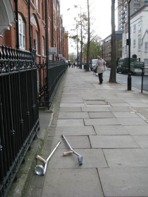 CrutchesOnPavementS.jpg