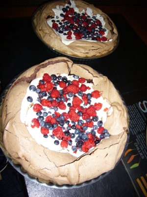 chocolate, raspberry, and blueberry pavlova