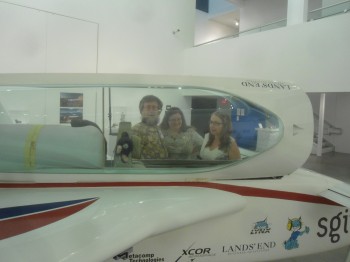 XCOR engineer Doug Weathers and his wife Anne discussing the EZ-Rocket cockpit with Lancaster artist and teacher Monica Mahoney.