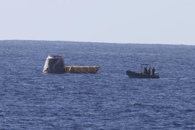 Dragon Capsule floating in Pacific